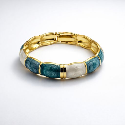 Capture the essence of the ocean with this striking gold-toned bangle. Combining a bold jewel-tone palette with an artisanal marbled texture, this piece is designed for those who love their accessories to tell a story.