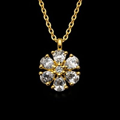 Celebrate the beauty of nature with this exquisitely detailed gold-toned pendant. Designed to mimic the delicate silhouette of a flower in full bloom, this piece combines timeless femininity with a high-wattage sparkle.