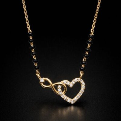 Celebrate an everlasting bond with this charming and modern Mangalsutra. Featuring a poetic fusion of two powerful symbols—the heart and the infinity loop—this gold-toned piece is a beautiful representation of love without end.