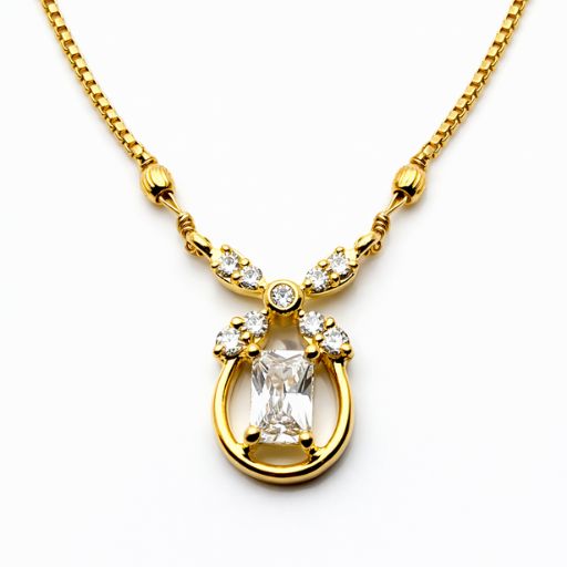 Exude timeless luxury with this strikingly modern gold-toned necklace. Centered around a classic emerald-cut crystal, this piece combines architectural structure with high-wattage sparkle for a sophisticated, high-jewelry aesthetic.