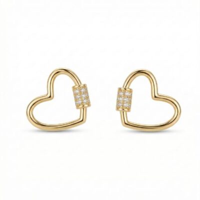 Redefine your romantic aesthetic with these playfully modern gold-toned studs. Combining the industrial edge of a carabiner clasp with the soft silhouette of a heart, these earrings offer a unique and high-fashion take on a timeless symbol of love.