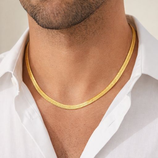 Embrace the peak of liquid luxury with this impeccably crafted gold-toned chain. Featuring a masterclass in fluid movement and high-shine surfaces, this piece offers a sleek, "second-skin" silhouette that serves as a bold statement of contemporary elegance.
