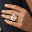 Step into a world of artisanal luxury with this breathtakingly unique statement ring. Featuring a masterclass in enamel artistry and organic form, this piece offers a "bloom on your hand" silhouette that serves as a vibrant expression of modern, feminine elegance.