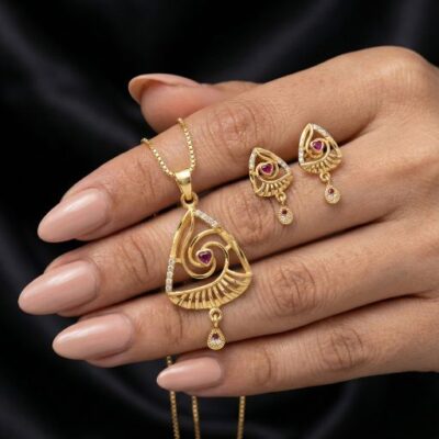 Embrace the peak of intricate architectural jewelry with this masterfully crafted gold-toned set. Featuring a masterclass in dynamic line-work and delicate light-play, this piece offers a sophisticated "spiral-star" silhouette that serves as a radiant expression of modern, symbolic elegance.