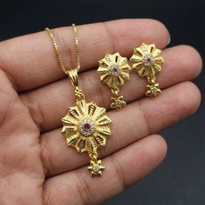 Embrace the peak of heritage-inspired luxury with this masterfully crafted jewelry set. Featuring a masterclass in radial symmetry and vibrant gemstone accents, this piece offers a sophisticated "mandala-style" silhouette that serves as a radiant expression of timeless power and grace.