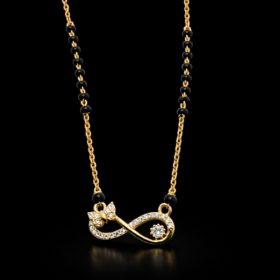 Embrace the beauty of transformation and eternal commitment with this whimsical gold-toned Mangalsutra. Featuring a poetic blend of symbols, this piece is designed for the woman who finds magic in every chapter of her journey.